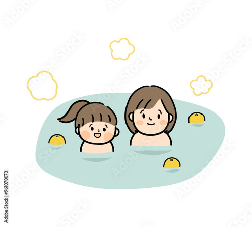 冬至のゆず湯に入浴する親子