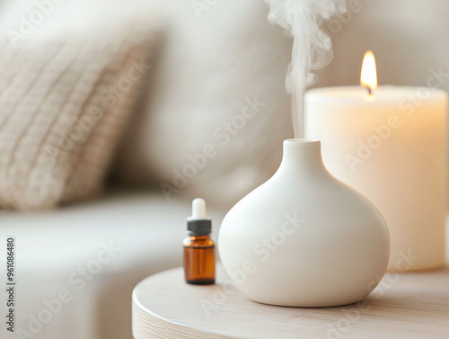 Fototapet A calming aromatherapy setup with essential oils, a diffuser, and soothing candles, promoting mental wellness and relaxation through peaceful, fragrant ambiance