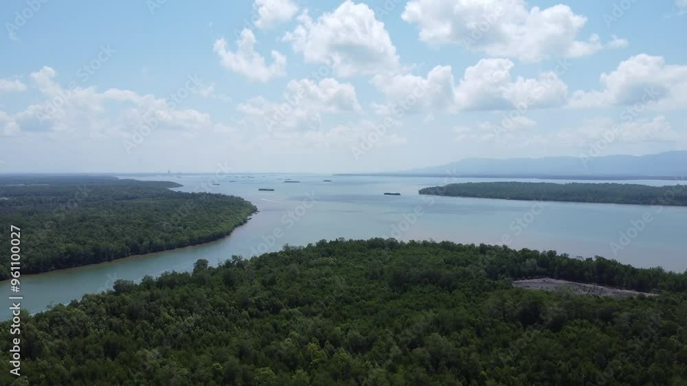 Aerial view of the winding river from the sea looks very beautiful, located in South Kalimantan. Aerial view of the winding river from the sea looks very beautiful, located in South Kalimantan.