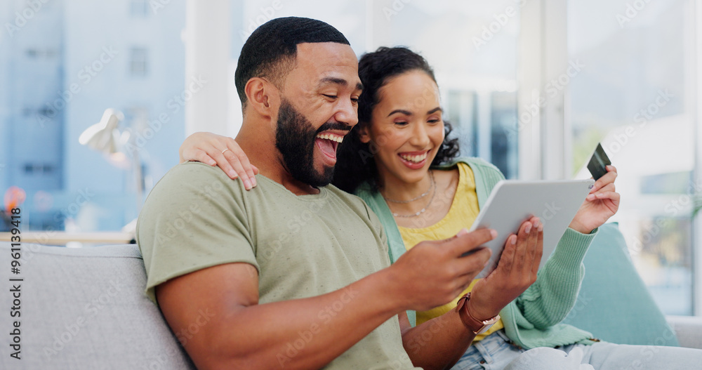 Fototapeta premium Excited couple, tablet or winning with credit card for ecommerce, cashback or banking app on sofa at home. Happy man, woman or shoppers with smile on technology for online shopping, bonus or discount