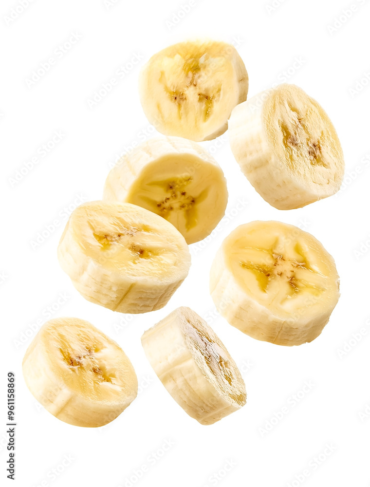 Flying banana slices, isolated on white background
