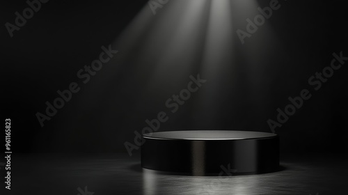 Black podium under a spotlight.