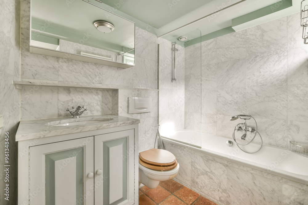 Elegant marble bathroom with modern fixtures Elegant marble bathroom with modern fixtures