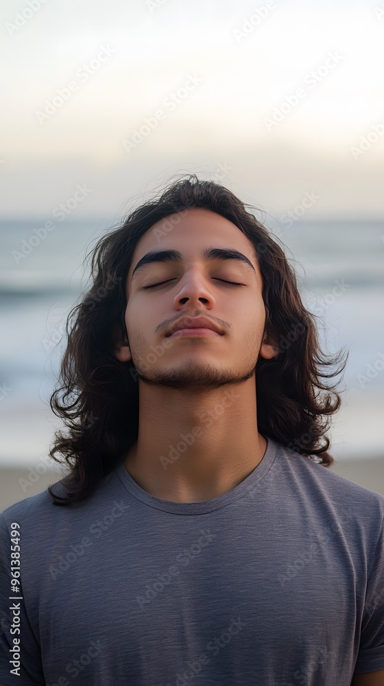 Young boy deep in thought at sunset beach Young boy deep in thought at sunset beach