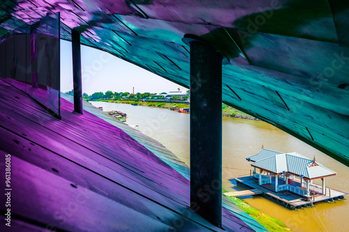 View of the Chao Phraya River through a skylight in a modern building at Nakhon Sawan Province photo