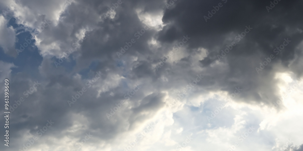Dramatic storm clouds in a moody sky captured at dusk Dramatic storm clouds in a moody sky captured at dusk