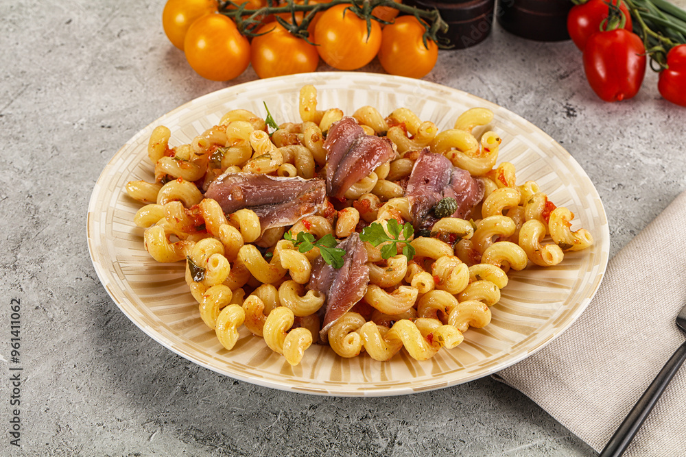 Italian pasta cellentani with anchovy Italian pasta cellentani with anchovy