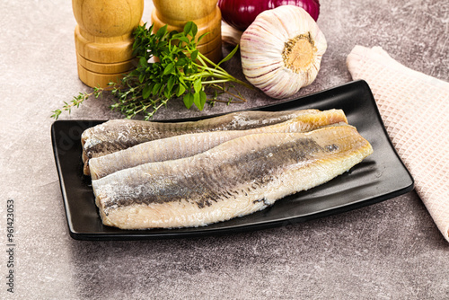 Marinated salted herring fillet apetizer