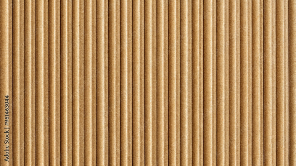 Brown cardboard texture with vertical grooves for packaging and crafts, copy space Brown cardboard texture with vertical grooves for packaging and crafts, copy space