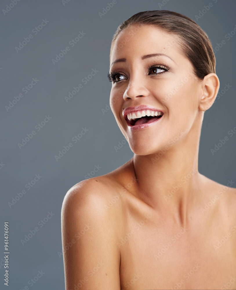 Beauty, skincare and face of happy woman in studio for wellness, cosmetics and facial treatment. Dermatology, mockup space and person with makeup for healthy skin, salon or smile on gray background Beauty, skincare and face of happy woman in studio for wellness, cosmetics and facial treatment. Dermatology, mockup space and person with makeup for healthy skin, salon or smile on gray background