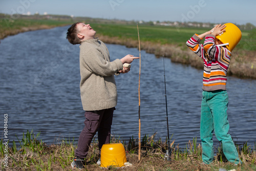 Fotografie Funny photo of fishermen