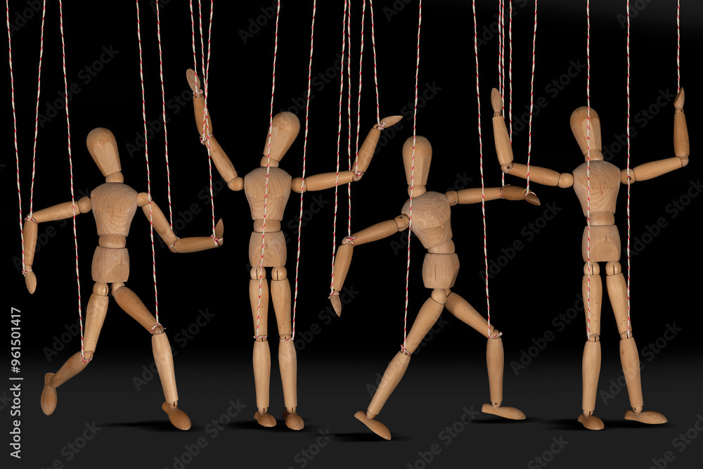 Wooden puppet doll, dancing marionette. Concept of emotional manipulation, world conspiracy theories Wooden puppet doll, dancing marionette. Concept of emotional manipulation, world conspiracy theories