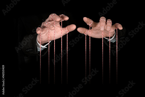 Konstfotografi Obeying master  hand pulling the strings