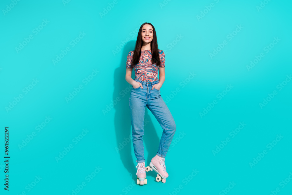 Full length photo of charming girly woman wear print shirt riding rollers empty space isolated turquoise color background Full length photo of charming girly woman wear print shirt riding rollers empty space isolated turquoise color background