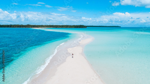 Beautiful Young Woman Run on the Maldivian Beach with White Sandbank. summer background, summer holiday. photo