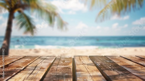 Blurred background of tropical beach with wooden table for product ad - Summer relaxation montage