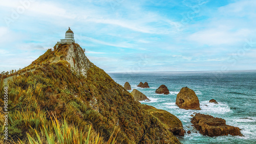 Nugget Point Lighthouse on the Catlins Coast of New Zealand. photo