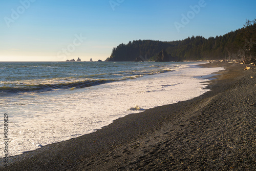 Wallpaper Mural Pebble-covered Rialto Beach with forested headland and sea stacks in Washington State. Rialto Beach, situated within Olympic National Park, is located near La Push, the Quileute Tribe's residence. Torontodigital.ca