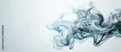  The smoke swirls against a gray and white backdrop; beneath it, a black and white patterned design lies