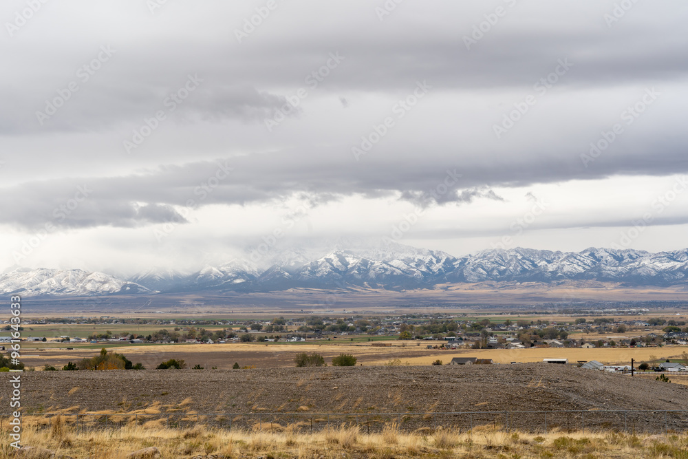 A cloudy and scenic view of the Stansbury Mountain range from Tooele, Utah. A cloudy and scenic view of the Stansbury Mountain range from Tooele, Utah.