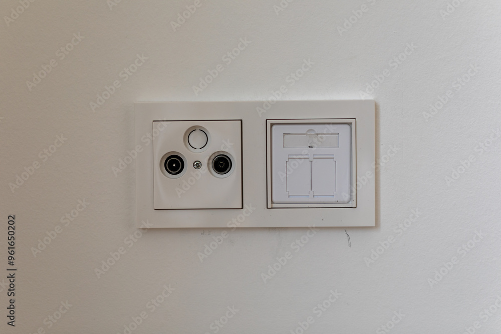 White Wall Mounted Outlet and Light Switch White Wall Mounted Outlet and Light Switch