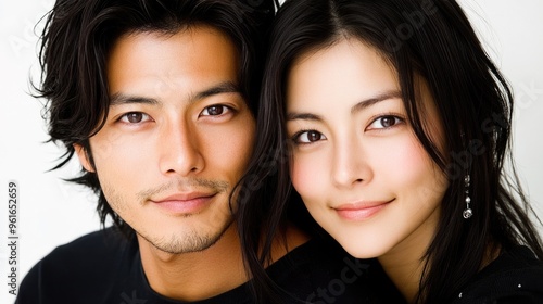 Attractive Young Couple Posing for a Close-up Portrait