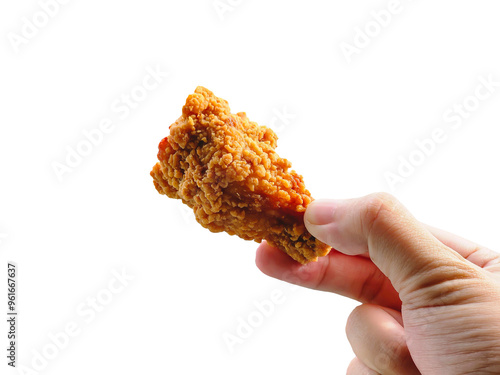 Hand holding fried chicken wing on transparent background