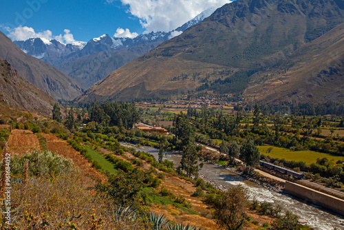 Train heading through the Andes in Peru with stunning landscape, Ollantaytambo is the last stop to get train to Machu Picchu at Peru photo