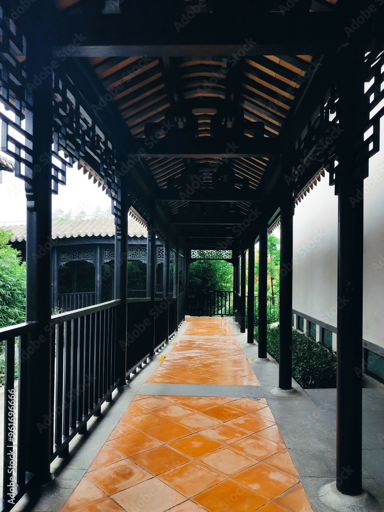 corridor with black pillars corridor with black pillars