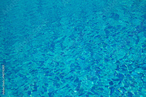 Swimming Pool Surface With Light Reflection and Water Ripple Patterns