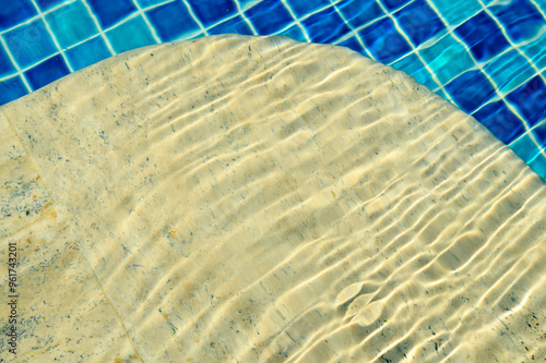 Swimming Pool Surface With Light Reflection and Water Ripple Patterns photo