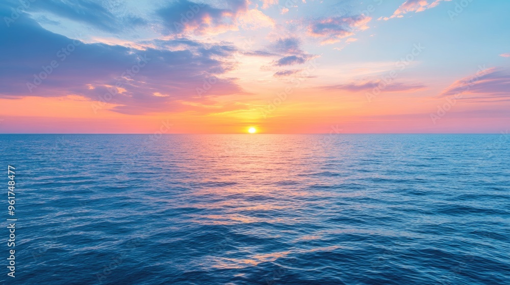 Sunset over a calm ocean, the sky painted with vibrant colors, symbolizing peace and beauty. Sunset over a calm ocean, the sky painted with vibrant colors, symbolizing peace and beauty.