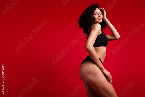 Photo of lovely seductive woman wear black stylish underwear no retouch body hips empty space isolated on red color background