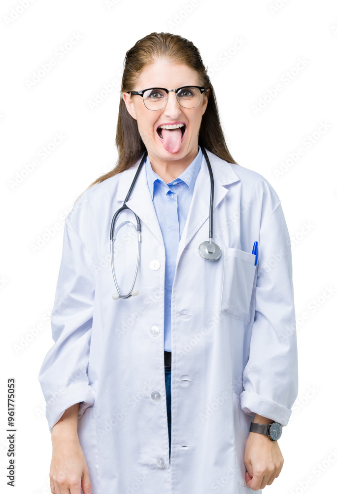 Middle age mature doctor woman wearing medical coat over isolated background sticking tongue out happy with funny expression. Emotion concept. Middle age mature doctor woman wearing medical coat over isolated background sticking tongue out happy with funny expression. Emotion concept.