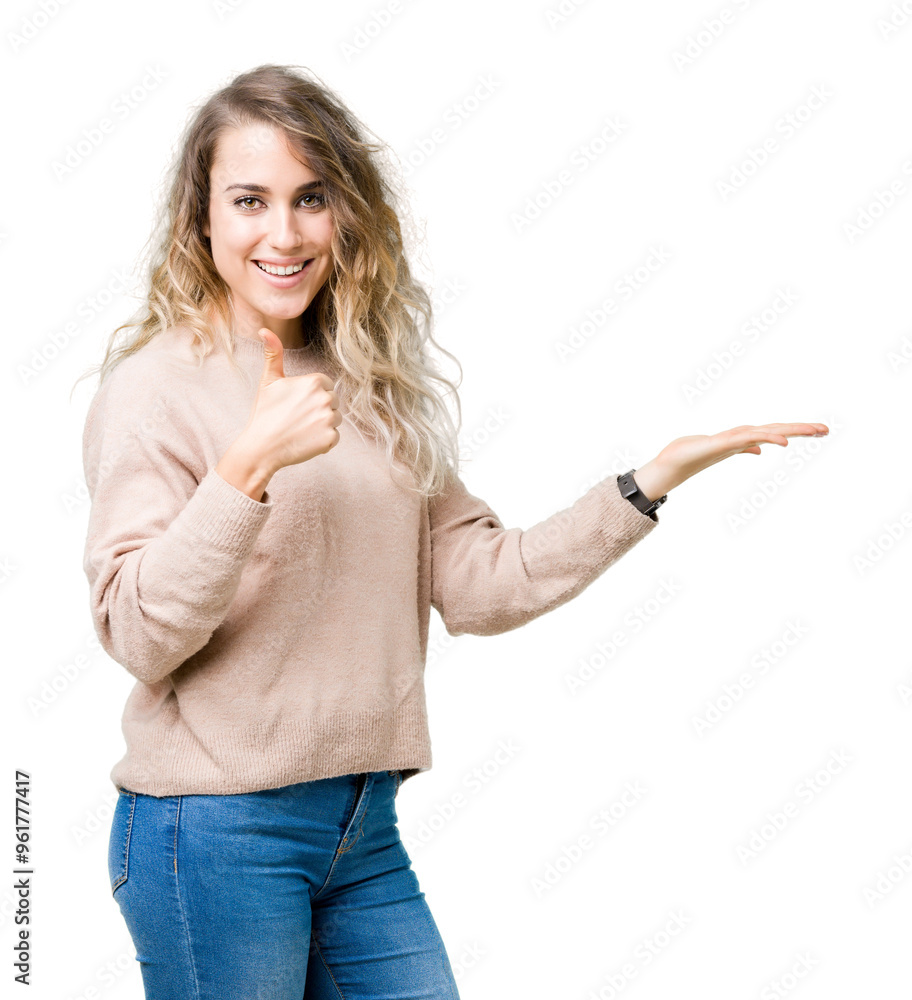 Beautiful young blonde woman wearing sweatershirt over isolated background Showing palm hand and doing ok gesture with thumbs up, smiling happy and cheerful Beautiful young blonde woman wearing sweatershirt over isolated background Showing palm hand and doing ok gesture with thumbs up, smiling happy and cheerful
