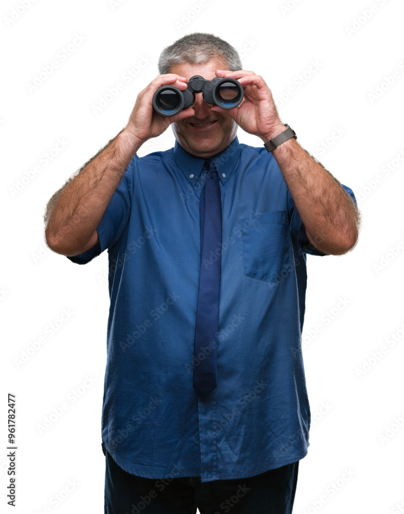 Handsome senior man looking through binoculars over isolated background with a happy face standing and smiling with a confident smile showing teeth Handsome senior man looking through binoculars over isolated background with a happy face standing and smiling with a confident smile showing teeth