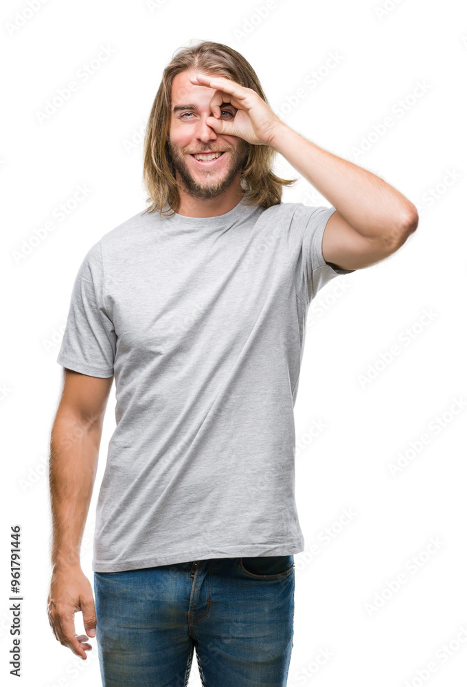Young handsome man with long hair over isolated background doing ok gesture with hand smiling, eye looking through fingers with happy face. Young handsome man with long hair over isolated background doing ok gesture with hand smiling, eye looking through fingers with happy face.