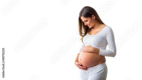 Pregnant woman gently holding her belly photo