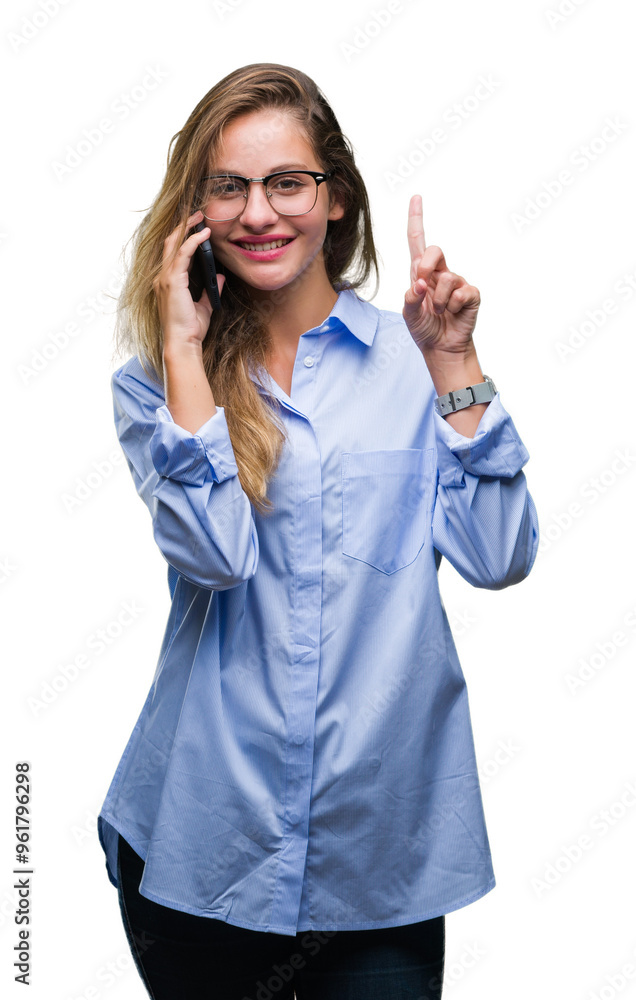Young beautiful blonde business woman calling using smartphone over isolated background surprised with an idea or question pointing finger with happy face, number one Young beautiful blonde business woman calling using smartphone over isolated background surprised with an idea or question pointing finger with happy face, number one