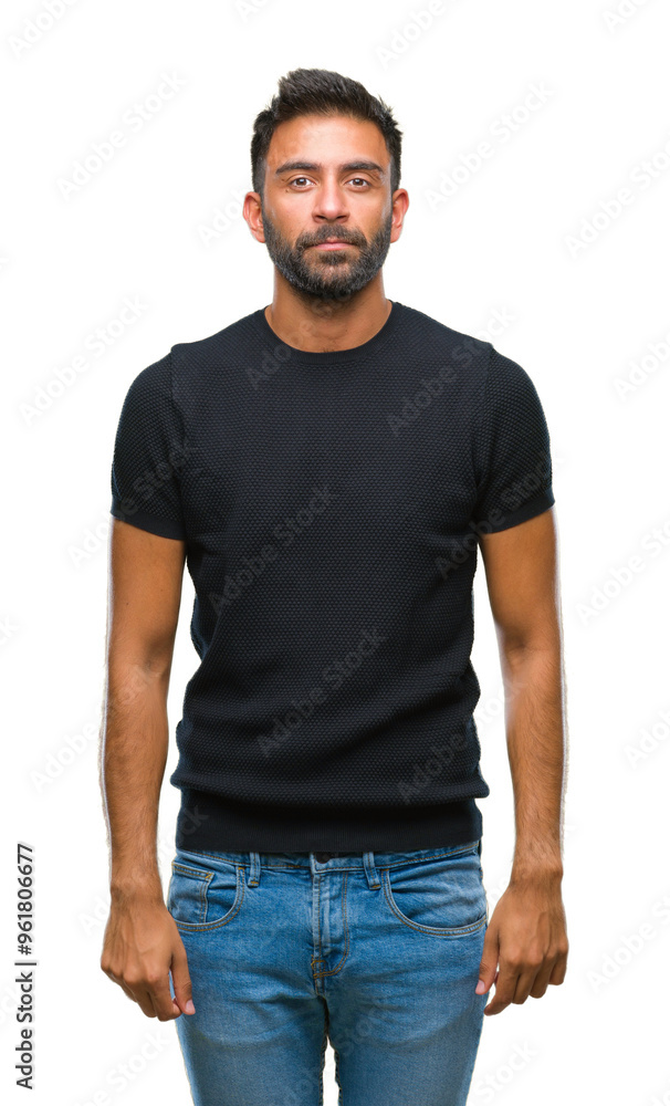 Adult hispanic man over isolated background with serious expression on face. Simple and natural looking at the camera. Adult hispanic man over isolated background with serious expression on face. Simple and natural looking at the camera.
