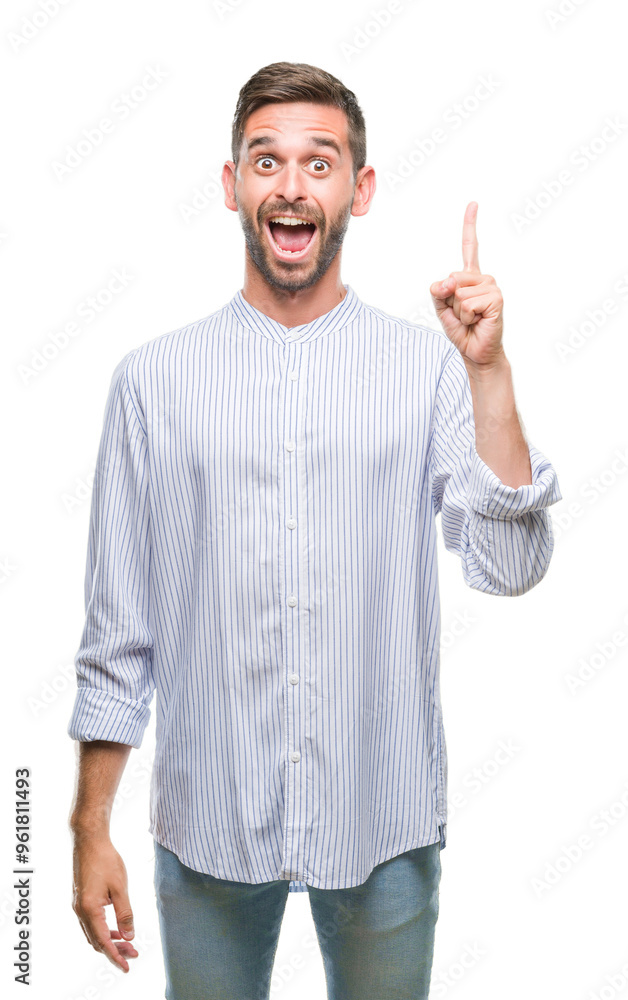 Young handsome man over isolated background pointing finger up with successful idea. Exited and happy. Number one. Young handsome man over isolated background pointing finger up with successful idea. Exited and happy. Number one.