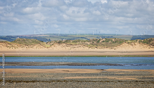 Wind farm of wind turbines on the coast at Westward Ho in Devon, UK on 3 September 2024 photo