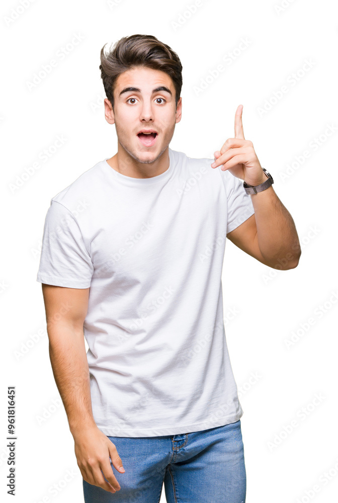 Young handsome man wearing white t-shirt over isolated background pointing finger up with successful idea. Exited and happy. Number one. Young handsome man wearing white t-shirt over isolated background pointing finger up with successful idea. Exited and happy. Number one.