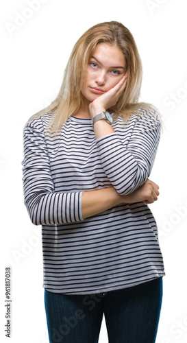 Young caucasian woman over isolated background thinking looking tired and bored with depression problems with crossed arms.