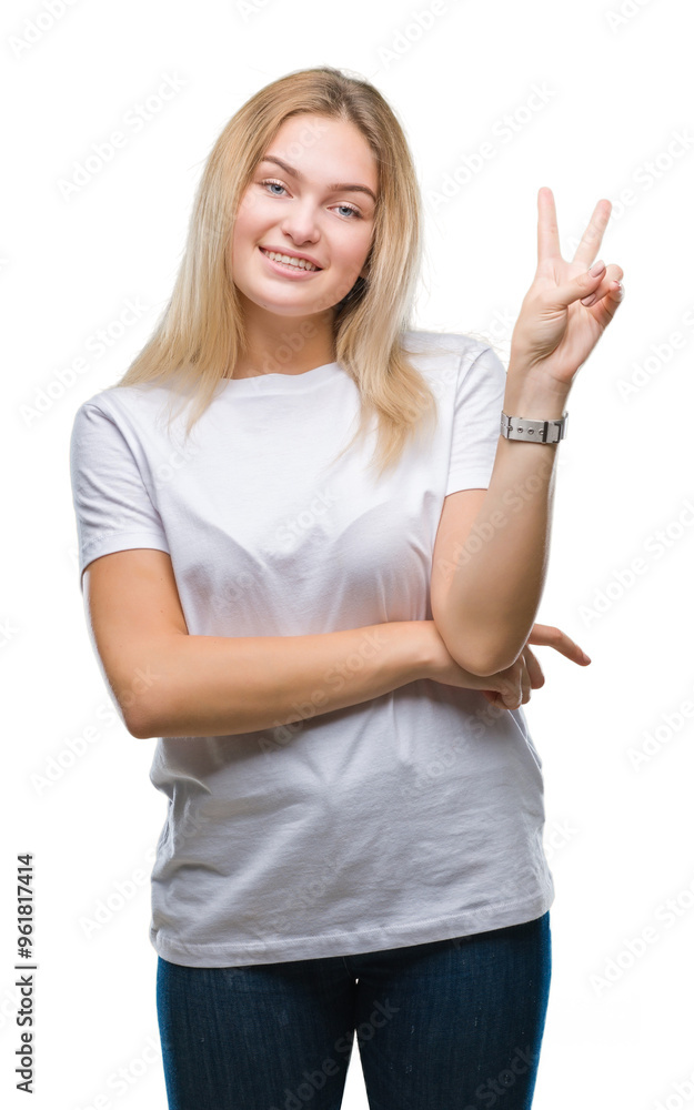 Young caucasian woman over isolated background smiling with happy face winking at the camera doing victory sign. Number two. Young caucasian woman over isolated background smiling with happy face winking at the camera doing victory sign. Number two.