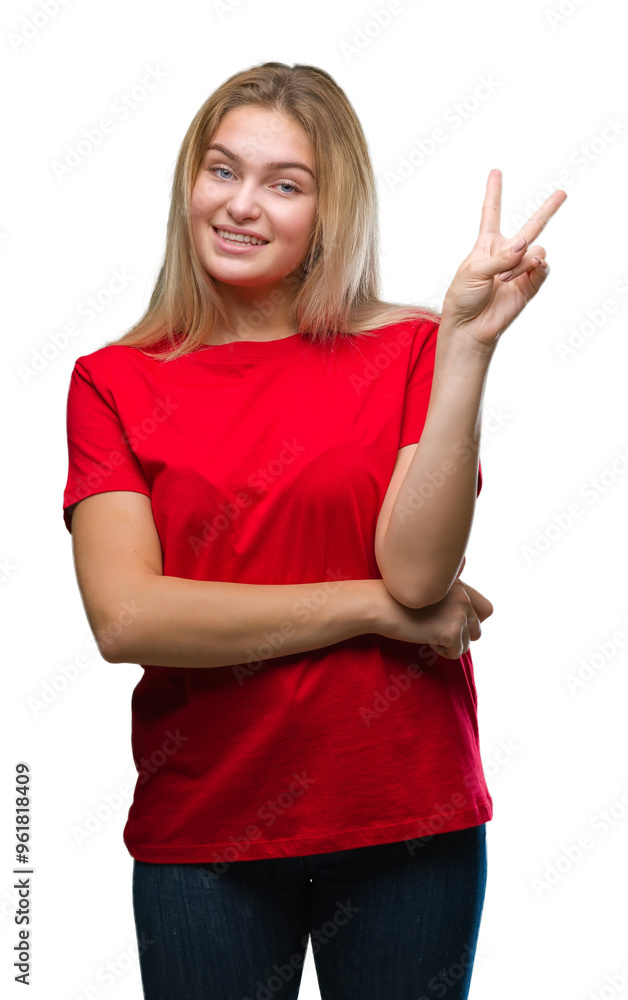 Young caucasian woman over isolated background smiling with happy face winking at the camera doing victory sign. Number two. Young caucasian woman over isolated background smiling with happy face winking at the camera doing victory sign. Number two.