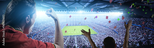 Photography IIIuminated American Football Stadium at night with enthusiastic fans