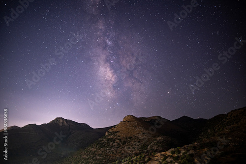 night panoramic landscape with starry sky on the island of Crete in Greece in August