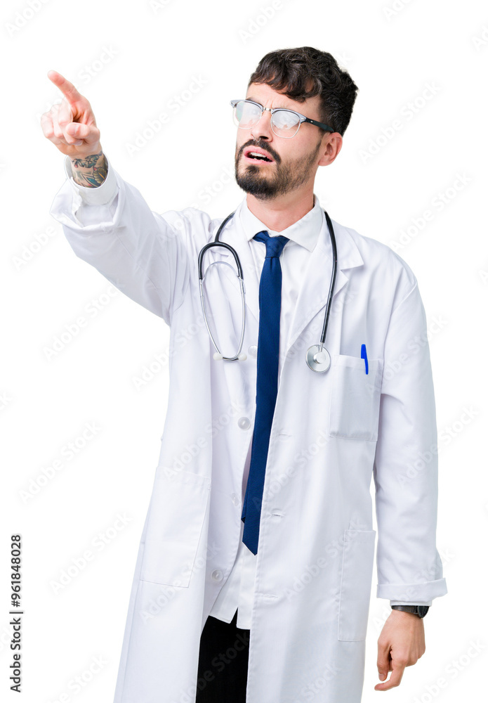 Young doctor man wearing hospital coat over isolated background Pointing with finger surprised ahead, open mouth amazed expression, something in front Young doctor man wearing hospital coat over isolated background Pointing with finger surprised ahead, open mouth amazed expression, something in front