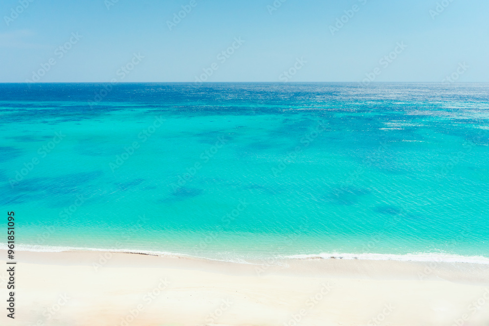 Nature landscape view of beautiful tropical beach and sea in sunny day. Beach sea space area. summer background and summer holiday concept. Nature landscape view of beautiful tropical beach and sea in sunny day. Beach sea space area. summer background and summer holiday concept.